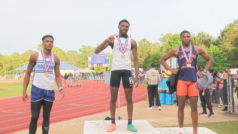 Canton's Antoine Spillman (center) won gold in the 5A 400 meter, followed by Callaway's...
