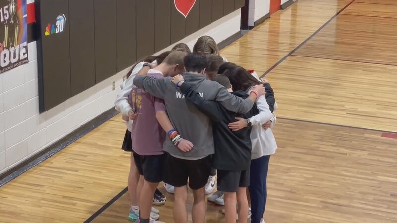 Students at West Lauderdale praying on global "See You At The Pole" day.