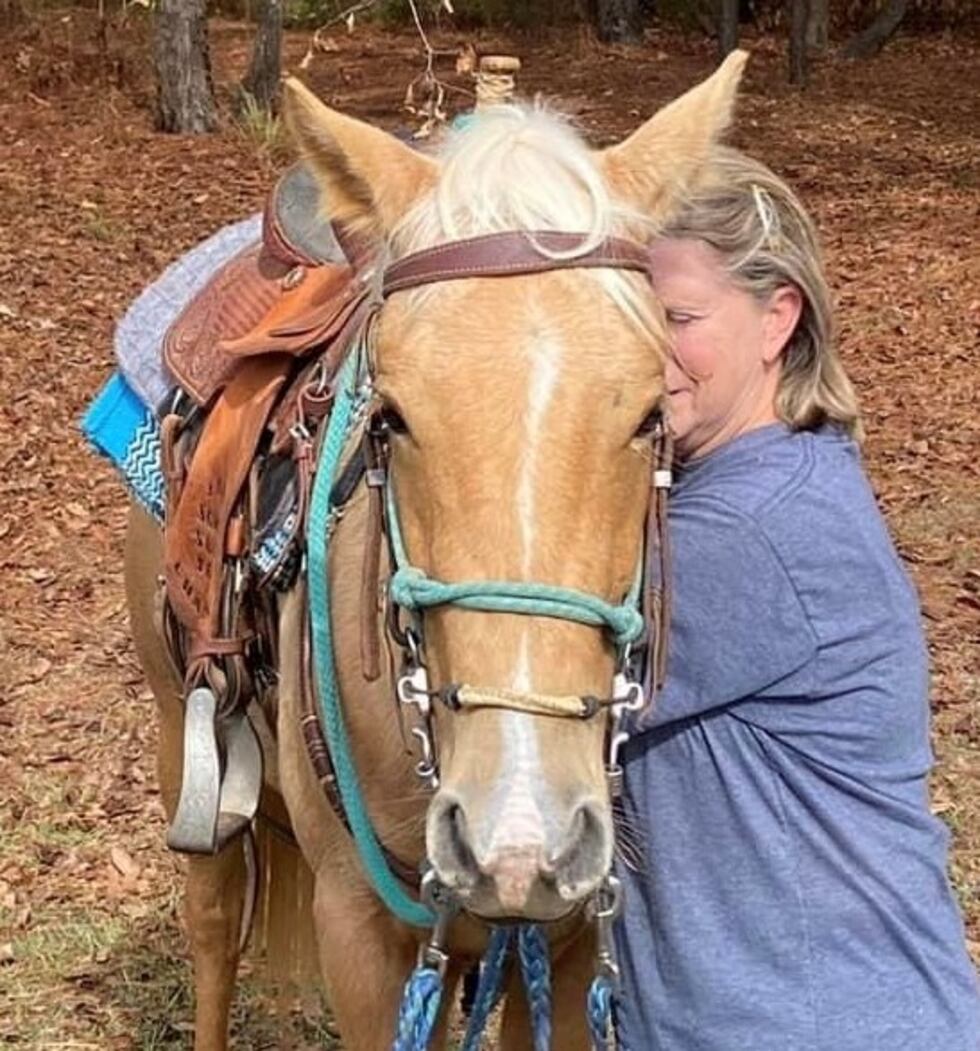 Kathy Rickles reunited with her horse, Ginger.