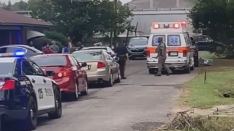 Police and Metro ambulance on scene of a shooting on 44th Ave.